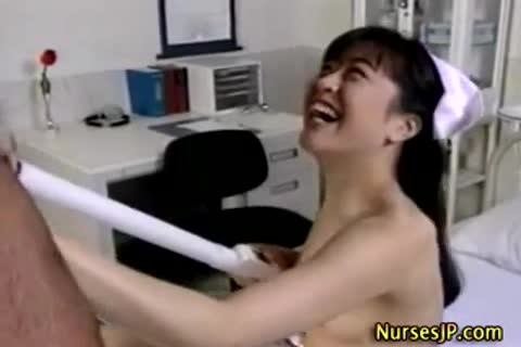 Doctor fisting asian nurse